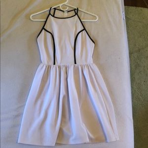 Cute short white dress with black detail